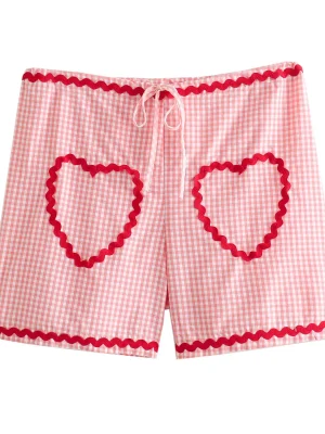 Heartfelt Chic: Vintage Pink Shorts w...